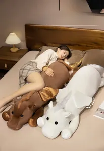 Detailed view of soft long unicorn plush body pillow used as a comfortable bed cushion