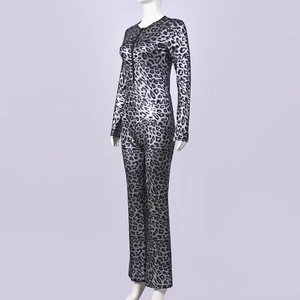 Side view detail of disco silver leopard print jumpsuit on mannequin showing sleek fit