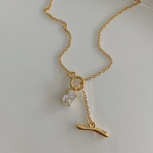 S925 sterling silver gold necklace featuring an oval zircon pendant and TO toggle clasp