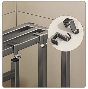 Close-up of dual movable hooks on a matte dark grey metal kitchen rack organizer