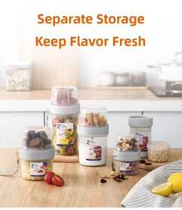 Dual-layer portable food storage container with leak-proof lid and convenient carry strap