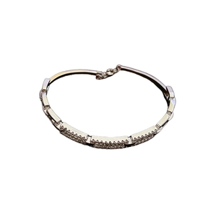 Elegant geometric silver bracelet with pave-set cubic zirconia and adjustable chain link