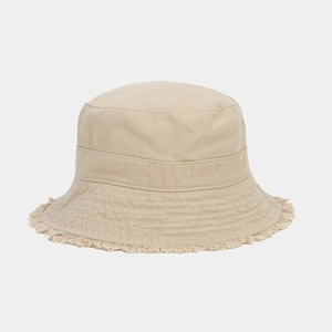 Detailed view of frayed edge on khaki canvas bucket hat with high quality stitching