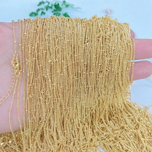 Detail of 18k gold plated necklace chains with a secure lobster clasp and extender