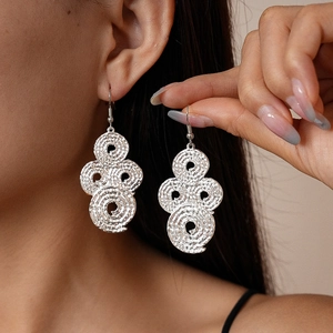 Silver large geometric drop earrings with hammered metal texture for a stylish look
