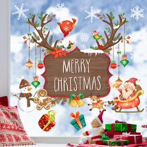 Christmas window stickers featuring Santa and Reindeer against a snowy winter background