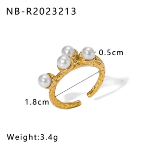 Detailed view of irregular 18K gold plated ring with pearls and size specifications
