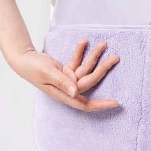 Breathable purple mesh apron with absorbent towel detail for efficient hand drying