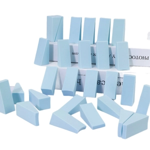 50-piece set of light blue non-latex triangle makeup sponges for dry and wet cosmetic use