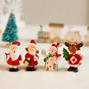 Miniature Christmas resin figurines set with Santa Claus, Snowman and Reindeer ornaments