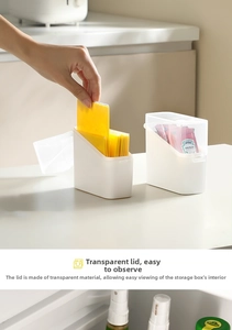 Close-up of the transparent flip lid and white base of the cheese slice storage box