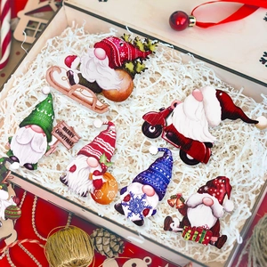 Set of 6 festive wooden Christmas gnome ornaments in a wooden gift box display