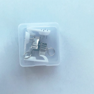 Wall hanging kit with non-marking nails and metal clips in a clear storage box