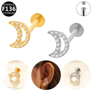 Macro shot of F136 titanium crescent moon cartilage stud with internalthreading and cubic zirconia