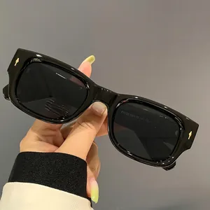 Classic rectangle sunglasses with sleek black frames and gold arrow rivet details