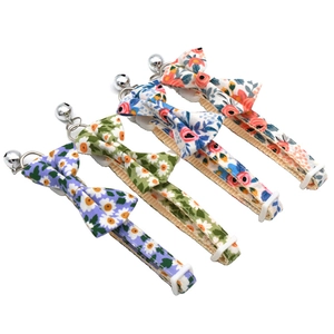Floral pet bow tie collar set in four colors with metal bells and adjustable buckles