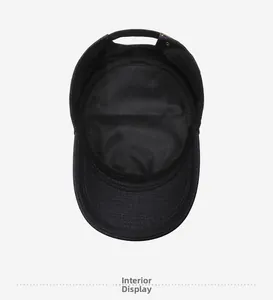 Detail view of the black flat top military cap interior lining and metal adjustment buckle