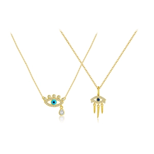 S925 sterling silver evil eye necklaces in gold finish with blue stones on white background