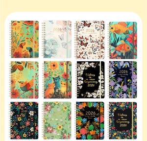 Detailed grid view of 12 stylish 2026 floral and animal A5 spiral planners with elastic bands