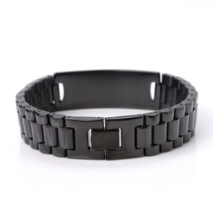 Detailed view of black stainless steel watch link bracelet with secure folding clasp