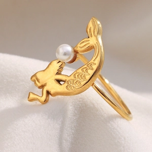 Detail of mermaid design ring with 18K gold plating and a single lustrous pearl
