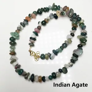 Detail view of natural Indian Agate chip stone necklace with gold lobster clasp