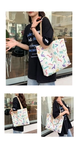 Multiple views showing the capacity and fit of this colorful printed canvas tote bag