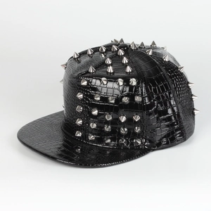 Close-up of black faux crocodile leather snapback hat with silver punk metal rivets