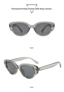 Detail view of vintage cat-eye sunglasses in transparent grey with metal rivet accents