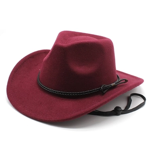 Close-up of wine red wool felt cowboy hat with black braided band and adjustable chin strap