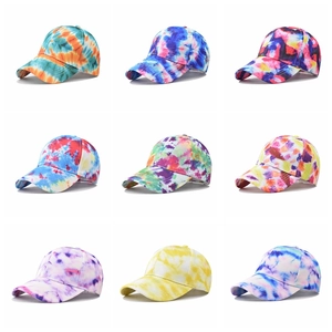 Collection of tie-dye cotton baseball caps with colorful starry gradients and graffiti patterns