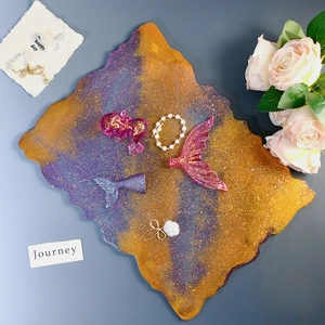 Irregular DIY resin tray mold with gold and purple glitter gradient and artisan accessories