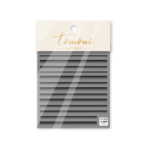Detail of French gradient nail stickers in black and grey on professional retail packaging