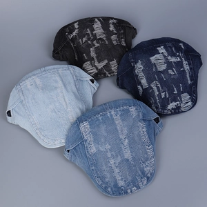 Flat lay of distressed denim ivy caps in charcoal, deep blue, medium blue, and light blue