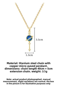Macro detail of star and planet pendant necklace with measurements and material specs