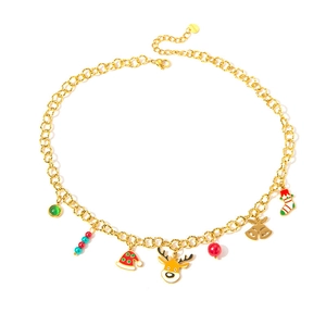 Detail of Christmas necklace featuring colorful reindeer, bells, and stocking pendants