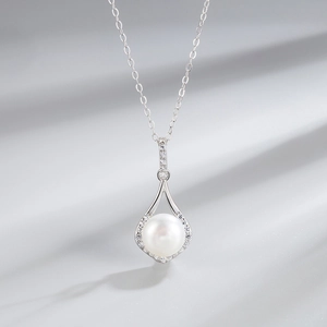 Elegant S925 silver necklace with a white teardrop pearl pendant and crystal accents