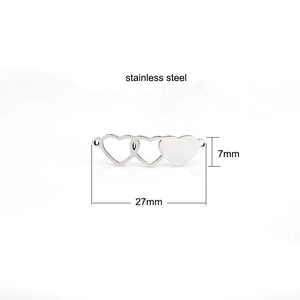Detailed view of three-heart stainless steel connector with 27mm width and 7mm height