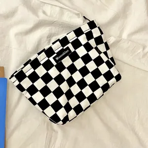 Large capacity black and white checkerboard makeup bag with canvas texture and zipper