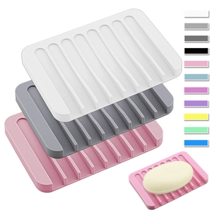 Silicone self-draining soap dish in various colors like white, grey and pink