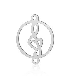 Macro view of silver stainless steel treble clef pendant for DIY jewelry making