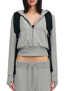 Detail of grey cropped zip-up hoodie with thumbhole cuffs and matching drawstring sweatpants