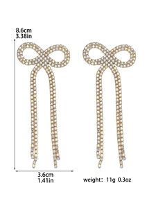 Detailed view of bow tassel earrings with dimensions 8.6x3.6cm and weight 11g specs