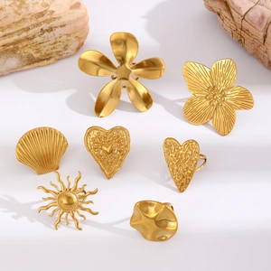 French retro gold plated titanium rings collection with floral and geometric patterns