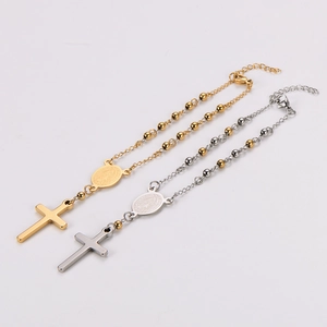 Gold and silver stainless steel rosary bracelets with cross and Guadalupe medal pendants