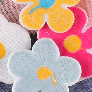 Embroidered 3D sunflower towel patches in yellow, pink, blue, and white colors