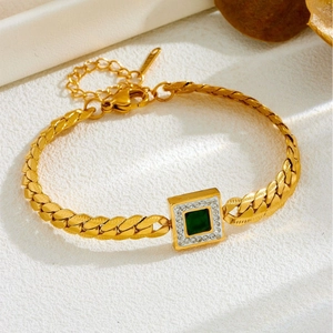 Elegant gold Cuban chain bracelet featuring a square emerald gemstone and zircon accents