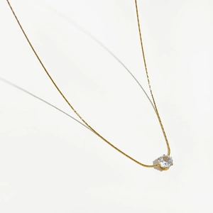 Elegant gold titanium steel necklace with sparkling round zircon pendant for women