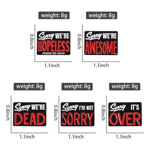 Detail showing five black enamel slogan badges with dimensions and weight specs