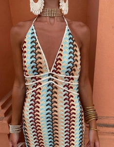 Detailed knit texture and multi-colored wavy pattern of this V-neck crochet party dress